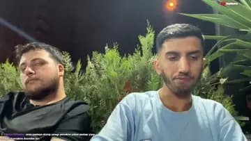 Yere oturup ikisini de yemek